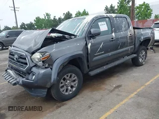 2017 Toyota Tacoma SR5 z VIN 3TMAZ5CN0HM039730, wystawiony jako IAAI lot #42406448 z przebiegiem 69 530 mil mil oraz . Historia ofert i sprzedaży dostępna na DreamBid. Obrazek 23.