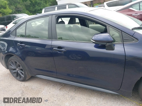 2024 Toyota Corolla SE with VIN JTDS4MCE5RJ103854, listed as a IAAI auction lot 42128851 with 53,379 mi miles. Bid and sale history available at carsss.com. Image 12.