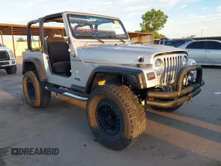 2002 Jeep Wrangler X with VIN 1J4FA39S42P763835, listed as a IAAI auction lot 42302645 with 233,634 mi miles and . Bid and sale history available at DreamBid. Image 1.