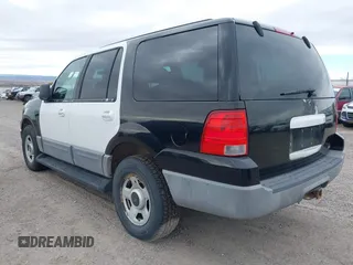 2003 Ford Expedition Special Service with VIN 1FMPU16L83LB21609, listed as a IAAI auction lot 40868519 with 125,518 mi miles. Bid and sale history available at carsss.com. Image 3.