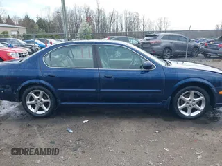 2003 Nissan Maxima GLE z VIN JN1DA31A03T412514, wystawiony jako IAAI lot #41856102 z przebiegiem 156 832 mil mil oraz . Historia ofert i sprzedaży dostępna na DreamBid. Obrazek 14.