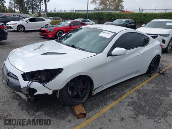 2014 Hyundai Genesis Coupe R-Spec z VIN KMHHT6KD3EU118357, wystawiony jako IAAI lot #40970527 z przebiegiem 94 174 mil mil oraz . Historia ofert i sprzedaży dostępna na DreamBid. Obrazek 23.