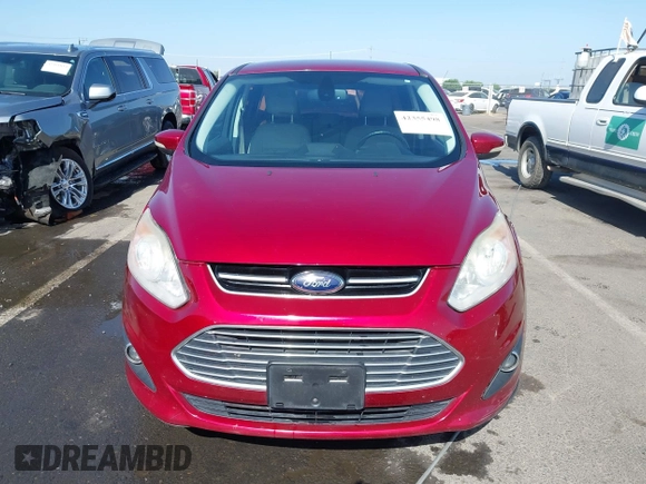 2013 Ford C-Max SEL z VIN 1FADP5CU4DL555035, wystawiony jako IAAI lot #42355498 z przebiegiem 172 374 mil mil oraz . Historia ofert i sprzedaży dostępna na DreamBid. Obrazek 12.