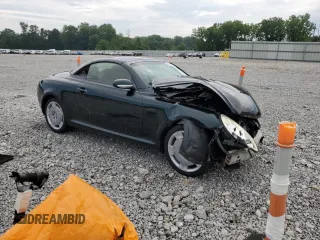 2002 Lexus SC 430 with VIN JTHFN48Y920006524, listed as a Copart auction lot 64680695 with 166,118 mi miles and Salvage title. Bid and sale history available at DreamBid. Image 4.