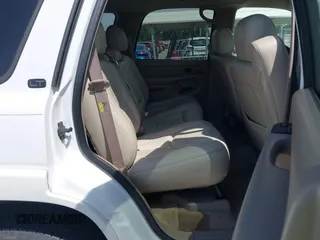 2004 Chevrolet Tahoe LT with VIN 1GNEC13Z94R117839, listed as a IAAI auction lot 42264254 with 230,597 mi miles and . Bid and sale history available at DreamBid. Image 8.