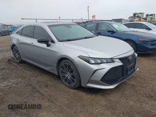 2019 Toyota Avalon XLE with VIN 4T1BZ1FB8KU006035, listed as a IAAI auction lot 41591179 with 111,917 mi miles. Bid and sale history available at carsss.com. Image 1.