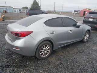 2016 Mazda Mazda3 i Sport with VIN 3MZBM1U76GM306988, listed as a IAAI auction lot 41286055 with 116,175 mi miles. Bid and sale history available at carsss.com. Image 4.