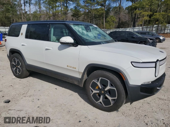 2024 Rivian R1S Adventure z VIN 7PDSGABA1RN030813, wystawiony jako Copart lot #47614385 z przebiegiem 16 946 mil mil oraz Szkody całkowita. Historia ofert i sprzedaży dostępna na DreamBid. Obrazek 4.