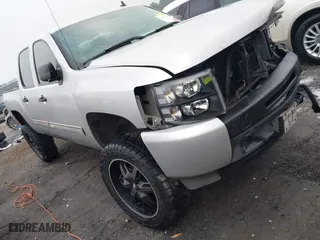 2010 Chevrolet Silverado 1500 LT with VIN 3GCRCSE05AG273077, listed as a IAAI auction lot 41521974 with 123,192 mi miles. Bid and sale history available at carsss.com. Image 1.