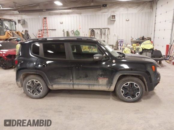 2015 Jeep Renegade Trailhawk with VIN ZACCJBCT7FPB35801, listed as a IAAI auction lot 41991084 with 119,887 mi miles and . Bid and sale history available at DreamBid. Image 13.