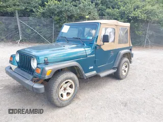 1997 Jeep Wrangler SE with VIN 1J4FY29P2VP446769, listed as a IAAI auction lot 42782194 with 98,352 mi miles and . Bid and sale history available at DreamBid. Image 2.