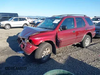 2002 Isuzu Rodeo with VIN 4S2DM58W624335632, listed as a IAAI auction lot 41690735 with 186,480 mi miles and . Bid and sale history available at DreamBid. Image 2.