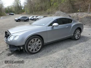 2014 Bentley Continental GT with VIN SCBFU7ZA9EC091703, listed as a Copart auction lot 54670605 with 85,311 mi miles and Salvage title. Bid and sale history available at DreamBid. Image 1.
