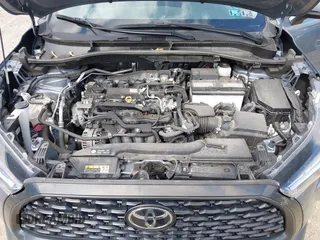 2023 Toyota Corolla Cross LE z VIN 7MUCAABG4PV063433, wystawiony jako IAAI lot #42227150 z przebiegiem 40 387 mil mil oraz . Historia ofert i sprzedaży dostępna na DreamBid. Obrazek 10.