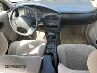 2000 Saturn SL z VIN 1G8ZK5276YZ224500, wystawiony jako Copart lot #45083945 z przebiegiem 130 766 mil mil oraz Szkoda całkowita • Salvage title. Historia ofert i sprzedaży dostępna na DreamBid. Obrazek 8.