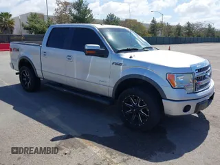 2013 Ford F-150 XL with VIN 1FTFW1ETXDFB30887, listed as a IAAI auction lot 41809584 with 191,496 mi miles. Bid and sale history available at carsss.com. Image 1.