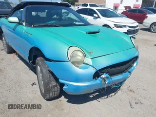 2002 Ford Thunderbird Hardtop Premium z VIN 1FAHP60AX2Y116343, wystawiony jako IAAI lot #42291076 z przebiegiem Nie podano mil oraz . Historia ofert i sprzedaży dostępna na DreamBid. Obrazek 19.
