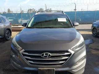 2017 Hyundai Tucson SE Plus with VIN KM8J33A40HU329666, listed as a IAAI auction lot 42084886 with 144,785 mi miles. Bid and sale history available at carsss.com. Image 12.