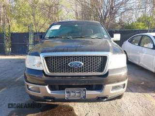 2005 Ford F-150 XLT with VIN 1FTPX14555NB72850, listed as a IAAI auction lot 41983657 with 229,268 mi miles. Bid and sale history available at carsss.com. Image 6.
