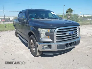2015 Ford F-150 XL with VIN 1FTEW1CG2FFC70680, listed as a IAAI auction lot 41871782 with 143,875 mi miles. Bid and sale history available at carsss.com. Image 1.