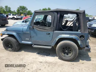 1999 Jeep Wrangler SE with VIN 1J4FY29P0XP422425, listed as a Copart auction lot 60513335 with Not provided miles and Clean title. Bid and sale history available at DreamBid. Image 2.