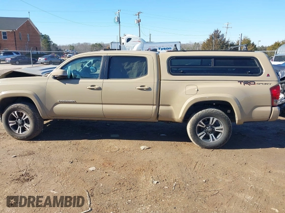 2017 Toyota Tacoma SR5 with VIN 3TMBZ5DN8HM009538, listed as a IAAI auction lot 41288551 with 84,551 mi miles and . Bid and sale history available at DreamBid. Image 14.