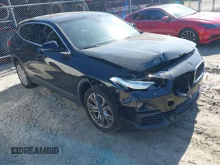 2018 BMW X2 xDrive28i z VIN WBXYJ5C32JEF74158, wystawiony jako IAAI lot #41985331 z przebiegiem 89 422 mil mil oraz . Historia ofert i sprzedaży dostępna na DreamBid. Obrazek 1.