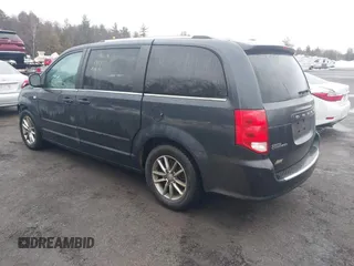 2014 Dodge Grand Caravan SXT with VIN 2C4RDGCG2ER463395, listed as a IAAI auction lot 41709948 with 137,783 mi miles and . Bid and sale history available at DreamBid. Image 3.