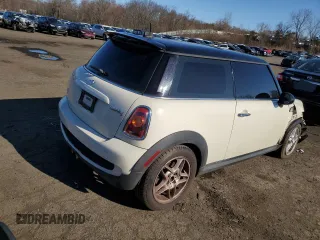 2007 MINI Hardtop S with VIN WMWMF73577TT86065, listed as a Copart auction lot 57262795 with 100,052 mi miles and Salvage Title. Bid and sale history available at DreamBid. Image 3.