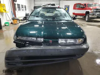 1996 Saturn SL with VIN 1G8ZH5284TZ379272, listed as a Copart auction lot 72447734 with 73,264 mi miles and Non Repairable. Bid and sale history available at carsss.com. Image 5.