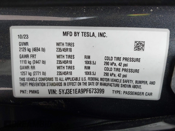 2023 Tesla Model 3 with VIN 5YJ3E1EA9PF673399, listed as a IAAI auction lot 42392643 with 7,571 mi miles and . Bid and sale history available at DreamBid. Image 9.