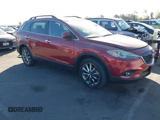 2014 Mazda CX-9 Grand Touring with VIN JM3TB3DV6E0435389, listed as a IAAI auction lot 41406200 with 181,598 mi miles and . Bid and sale history available at DreamBid. Image 1.