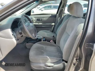 2003 Ford Taurus z VIN 1FAFP52243A153793, wystawiony jako Copart lot #55254105 z przebiegiem 89 668 mil mil oraz Szkody całkowita. Historia ofert i sprzedaży dostępna na DreamBid. Obrazek 7.