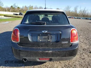 2016 MINI Hardtop 4 Door with VIN WMWXU1C50G2D09465, listed as a Copart auction lot 54975005 with 62,715 mi miles and Salvage Title. Bid and sale history available at DreamBid. Image 6.