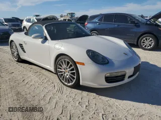 2007 Porsche Boxster S z VIN WP0CB29837U730970, wystawiony jako Copart lot #77829184 z przebiegiem Nie podano mil oraz Szkoda całkowita • Salvage title. Historia ofert i sprzedaży dostępna na DreamBid. Obrazek 4.