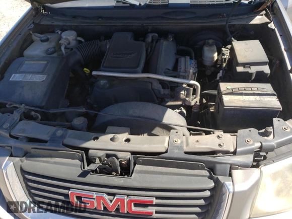 2005 GMC Envoy SLE с VIN 1GKDS13S852264341, выставлен на аукционе Copart как лот 49835015 с пробегом 178 401 миль миль и Списание • Salvage title. История ставок и продаж доступна на DreamBid. Изображение 13.