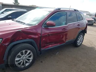 2019 Jeep Cherokee Latitude with VIN 1C4PJLCX5KD347695, listed as a IAAI auction lot 41910370 with 86,713 mi miles and . Bid and sale history available at carsss.com. Image 6.