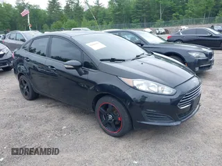 2015 Ford Fiesta SE z VIN 3FADP4BJ5FM140602, wystawiony jako IAAI lot #42435955 z przebiegiem 117 629 mil mil oraz . Historia ofert i sprzedaży dostępna na DreamBid. Obrazek 1.