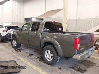 2005 Nissan Frontier 4WD LE with VIN 1N6AD07W95C411421, listed as a IAAI auction lot 41847242 with 209,816 mi miles. Bid and sale history available at carsss.com. Image 3.