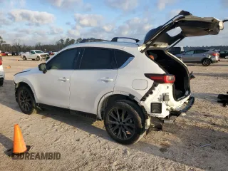 2024 Mazda CX-5 2.5 Carbon Turbo with VIN JM3KFBAY8R0443122, listed as a Copart auction lot 48023315 with 9,586 mi miles and Salvage Title. Bid and sale history available at carsss.com. Image 2.