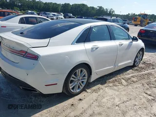 2015 Lincoln MKZ with VIN 3LN6L2G91FR606753, listed as a IAAI auction lot 42693490 with Not provided miles and . Bid and sale history available at DreamBid. Image 4.