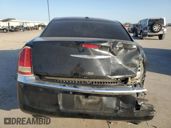2012 Chrysler 300 with VIN 2C3CCAET3CH256182, listed as a Copart auction lot 52744035 with 153,490 mi miles and Salvage Title. Bid and sale history available at carsss.com. Image 6.