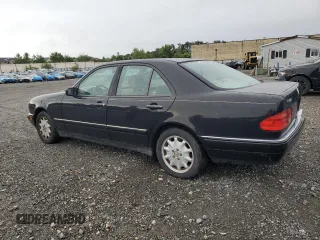 1999 Mercedes-Benz E-Class with VIN WDBJF65H9XA929577, listed as a Copart auction lot 71932364 with 84,806 mi miles and Salvage Title. Bid and sale history available at carsss.com. Image 2.
