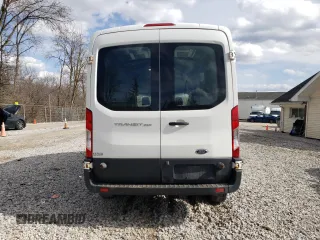 2017 Ford Transit with VIN 1FTYR2CM5HKB46378, listed as a Copart auction lot 50690895 with 185,337 mi miles and Salvage title. Bid and sale history available at DreamBid. Image 6.