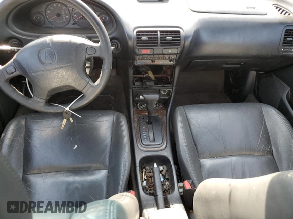 1999 Acura Integra z VIN JH4DB7668XS005069, wystawiony jako Copart lot #61384394 z przebiegiem 207 353 mil mil oraz Szkoda całkowita • Salvage title. Historia ofert i sprzedaży dostępna na DreamBid. Obrazek 8.