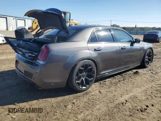2017 Chrysler 300 S with VIN 2C3CCABG7HH616049, listed as a Copart auction lot 79654744 with 84,812 mi miles and Salvage Title. Bid and sale history available at DreamBid. Image 3.