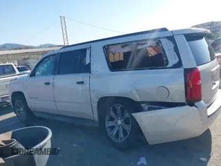 2015 Chevrolet Suburban LT with VIN 1GNSCJKC9FR295169, listed as a IAAI auction lot 42374760 with Not provided miles and . Bid and sale history available at DreamBid. Image 13.