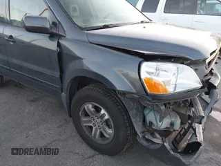 2005 Honda Pilot EX-L z VIN 2HKYF187X5H514571, wystawiony jako IAAI lot #41746538 z przebiegiem 276 994 mil mil oraz . Historia ofert i sprzedaży dostępna na DreamBid. Obrazek 17.