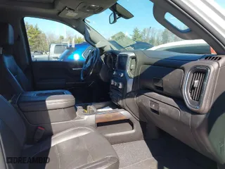 2019 GMC Sierra 1500 SLT with VIN 1GTU9DED3KZ116883, listed as a IAAI auction lot 41828826 with 128,062 mi miles. Bid and sale history available at carsss.com. Image 5.
