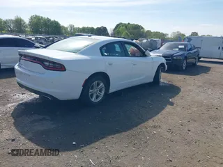 2019 Dodge Charger SXT with VIN 2C3CDXBG7KH661578, listed as a IAAI auction lot 39126917 with 117,594 mi miles. Bid and sale history available at carsss.com. Image 4.
